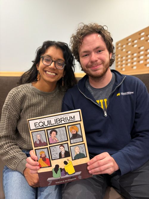 Charu and Colter pose with the newest edition of EquilibriUM Magazine.